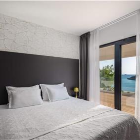 Luxury Beachfront Villa with Heated Infinity Pool near Trogir, Sleeps 8